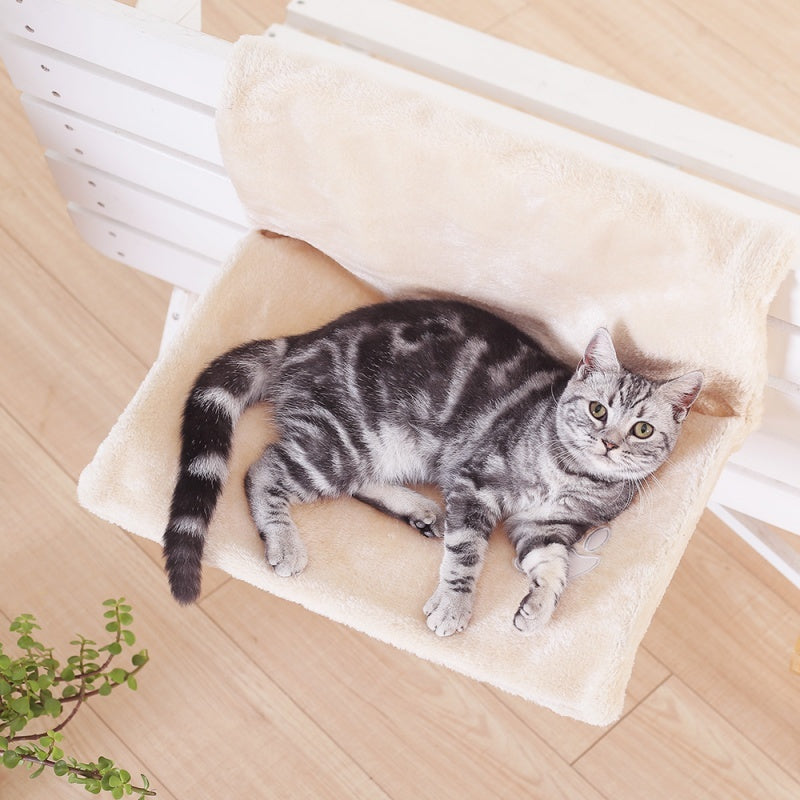 Värmebädden – Kattsäng som hängs på elementet